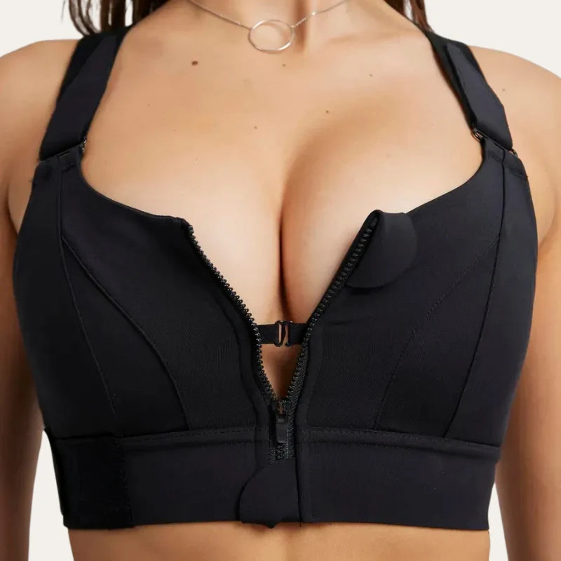 Detalhe frontal do soutien desportivo Alba preto, com fecho de correr, colchete de segurança e cobertura alta
